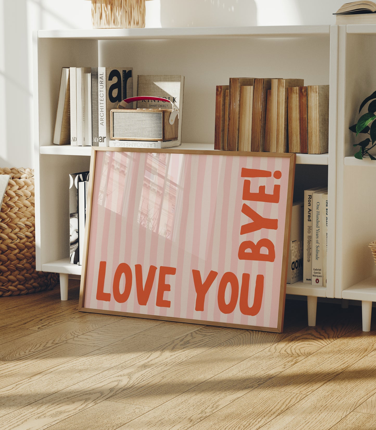 Horizontal wall print with soft pink wavy vertical stripes and bold red rounded typography reading LOVE YOU BYE! in the bottom corner