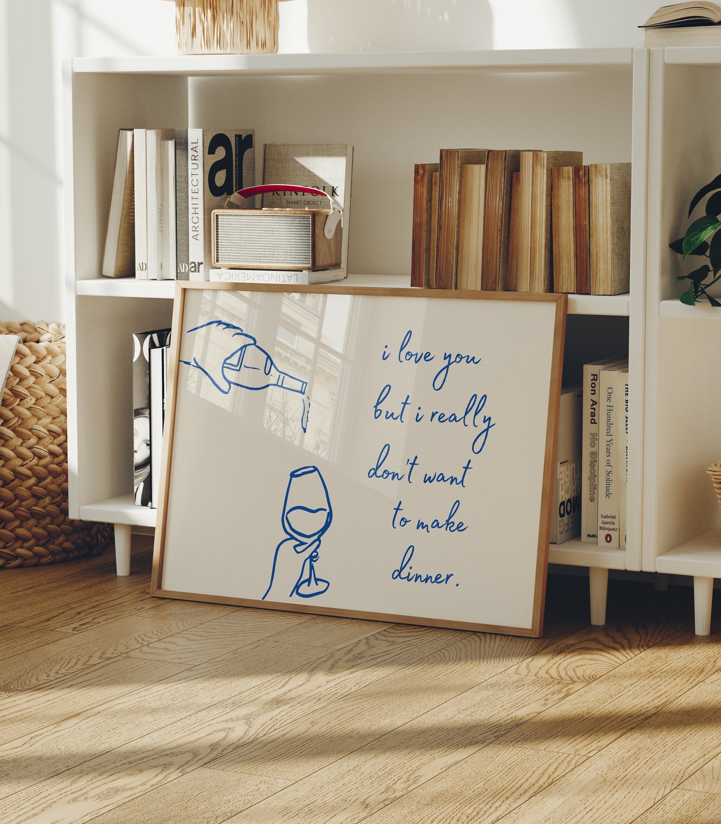 Print with hand-drawn blue line art of a bottle pouring wine into a glass beside the cursive quote "i love you but i really don't want to make dinner."
