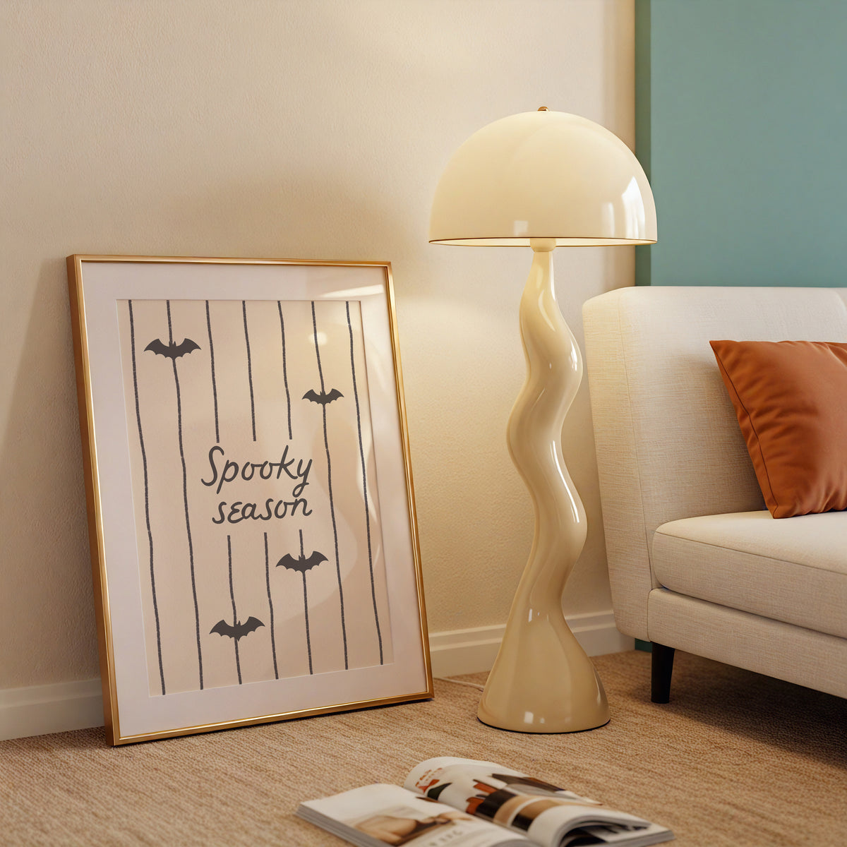 Portrait digital print with a tan and cream striped background featuring the hand-lettered phrase "Spooky season" in black script, accented with three minimalist black bat silhouettes.