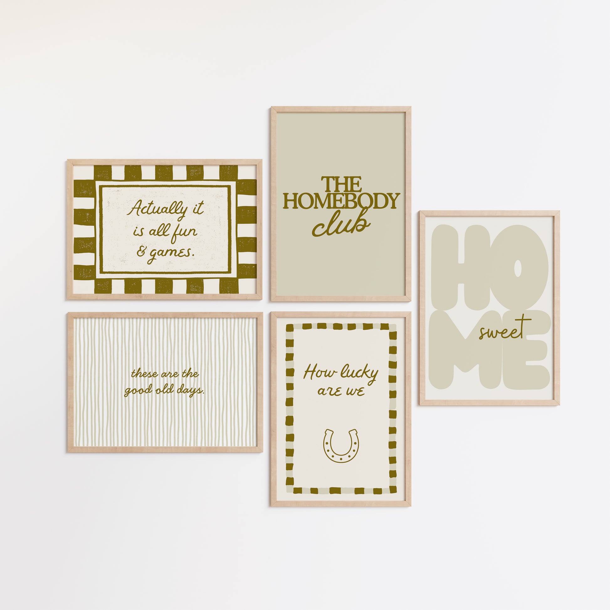 Set of five olive and cream prints including a checkered 'Actually it is all fun & games' print, a horseshoe 'How lucky are we' print, 'The Homebody Club', a striped 'good old days' print, and bubble-letter 'Home sweet'