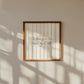 Cream print with thin vertical blue stripes and a hand-lettered quote in blue cursive script