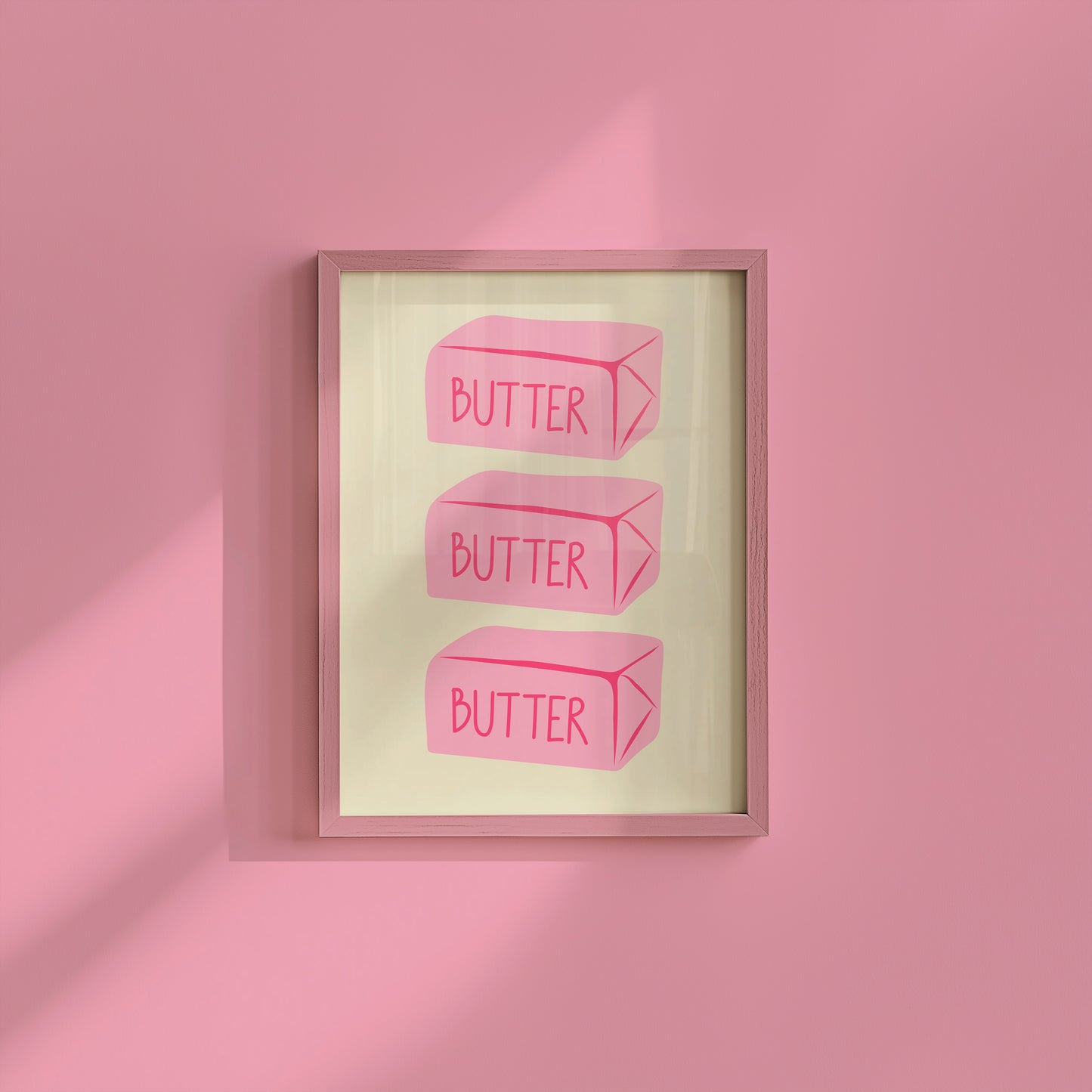 Vertical sage green wall print featuring three stacked illustrated pink butter blocks each labelled BUTTER in bold pink handwritten font