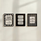 Set of 3 black and white bathroom prints: "Wash your hands ya filthy animal" in black cursive bordered by a black and white checkered frame, three black ticket-stub illustrations reading "Splish Splash, Admit One," and "I See London I See France" in a scalloped stamp frame on black and white stripes.