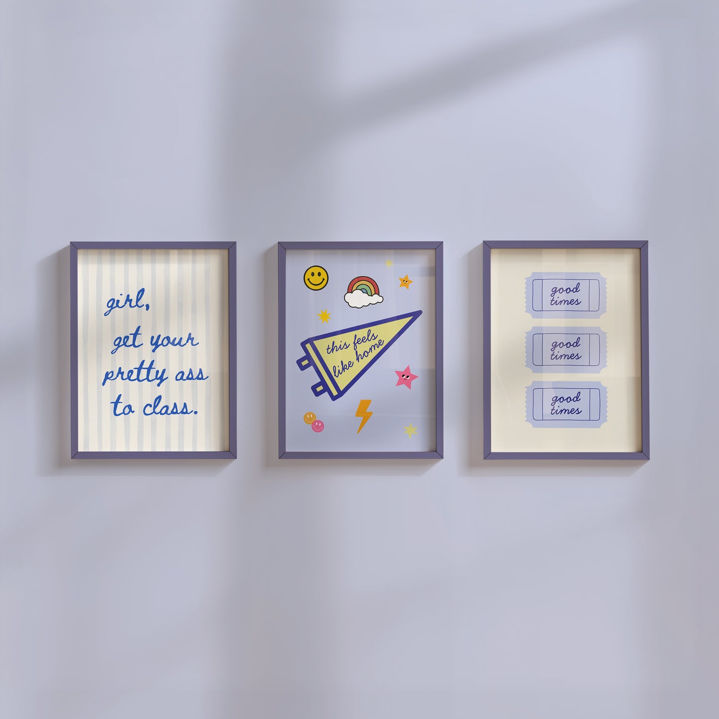 Set of 3 vertical preppy blue dorm room prints featuring a cursive stripe quote, a varsity pennant with stickers, and a retro good times ticket design