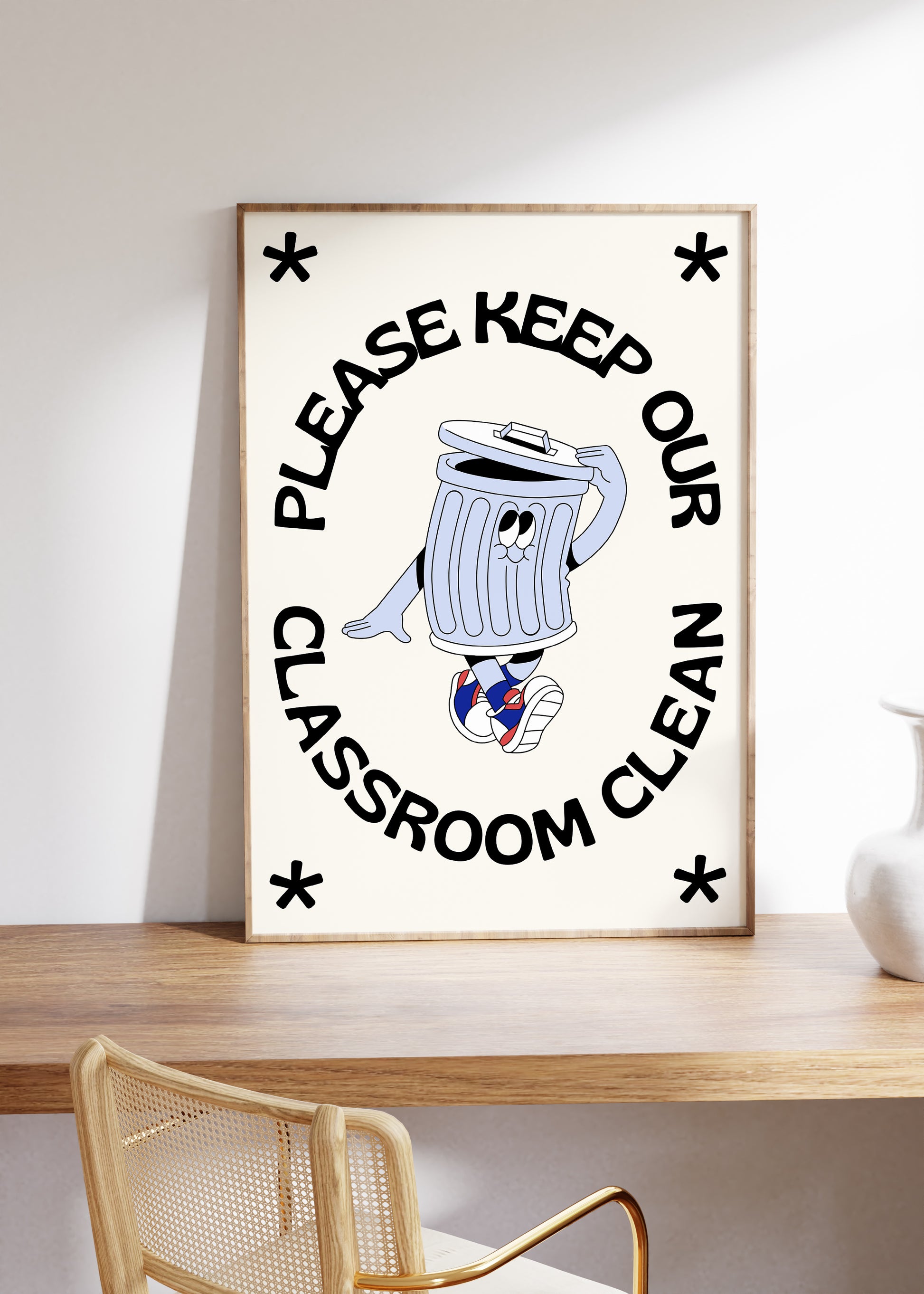 Vertical cream wall print with bold arched black typography reading Please Keep Our Classroom Clean surrounding a retro cartoon trash can character wearing sneakers with asterisk corner details