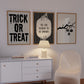Set of 3 black and white Halloween prints: dripping "Trick or Treat" typography, "'Tis the season to be spooky" framed by skeleton hands, and a black silhouette branch with hanging jack-o'-lanterns.