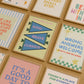 Set of 10 pastel classroom prints in a retro style, including blue pennant flags reading kind, brave, curious, a daily feelings check-in chart with smiling star, cloud, and sun characters, a puzzle piece print reading "There's a place for everyone," and colourful typography posters with quotes like "Wrong answers welcome," "Yes you can," and "It's a good day to try again."