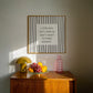 Square print with bold black and white vertical stripes framing the quote "i love you but i really don't want to make dinner" in dark gray block lettering.
