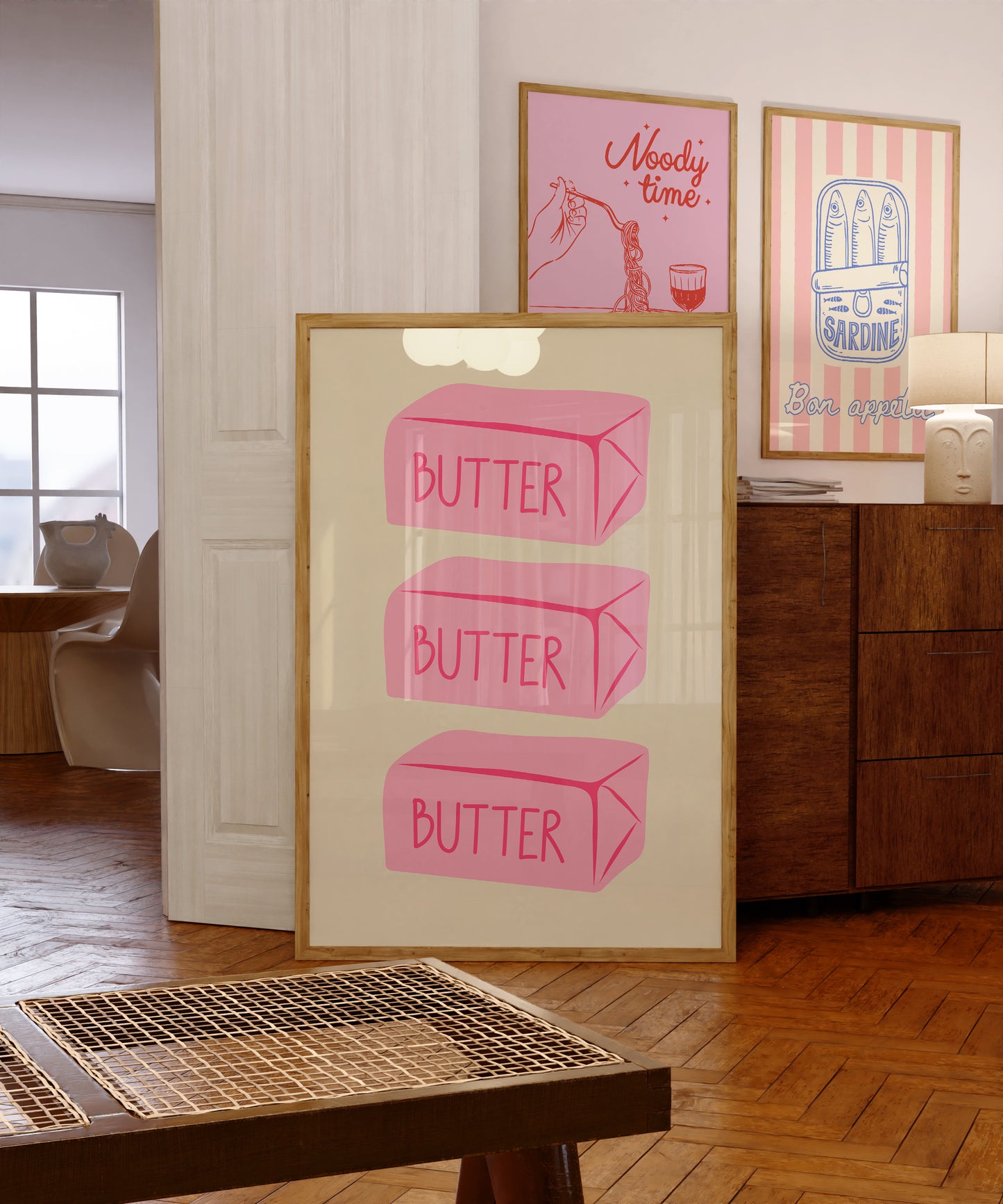 Vertical sage green wall print featuring three stacked illustrated pink butter blocks each labelled BUTTER in bold pink handwritten font