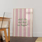 Print with soft pink hand-painted brush stroke stripes and the quote "What's the best that can happen" in script lettering.