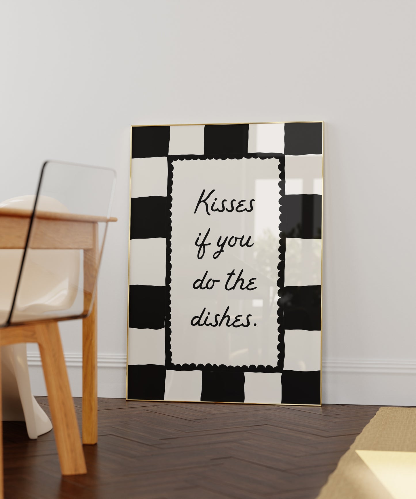 Black and white checkered print with a scalloped border and the handwritten quote "Kisses if you do the dishes" in black script