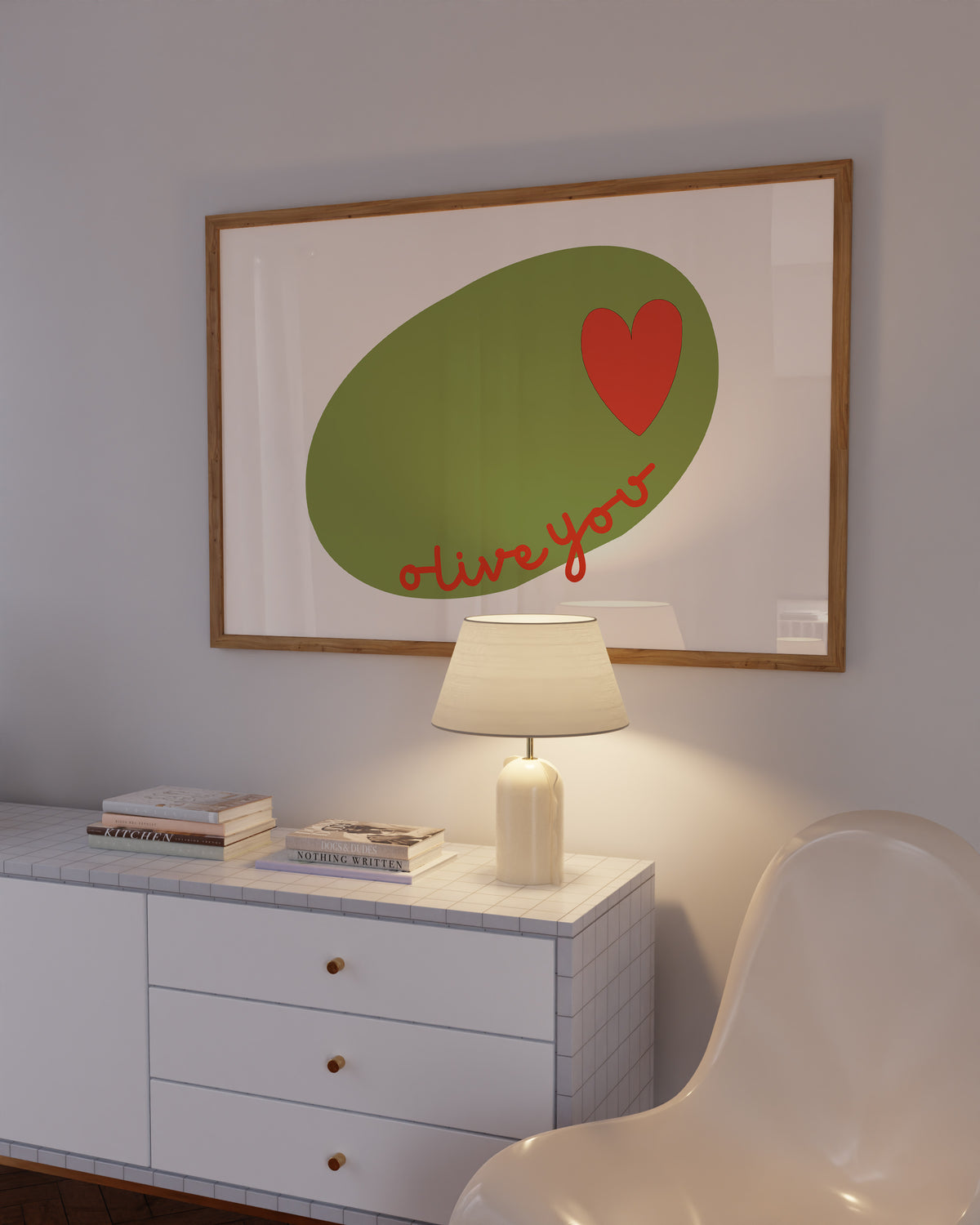 Horizontal print of a large green olive illustration with a small red heart and the words "olive you" in red cursive script, on a cream background.