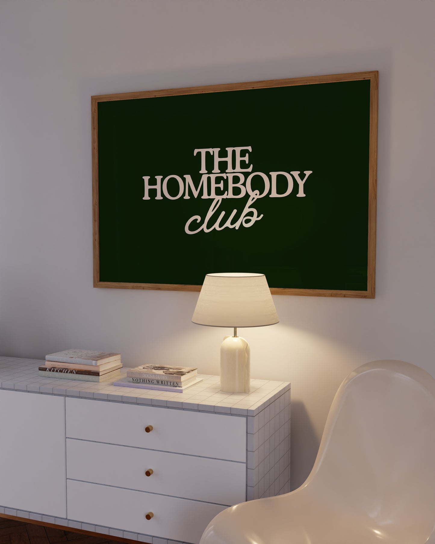 Dark green print with "The Homebody Club" in cream serif and script typography