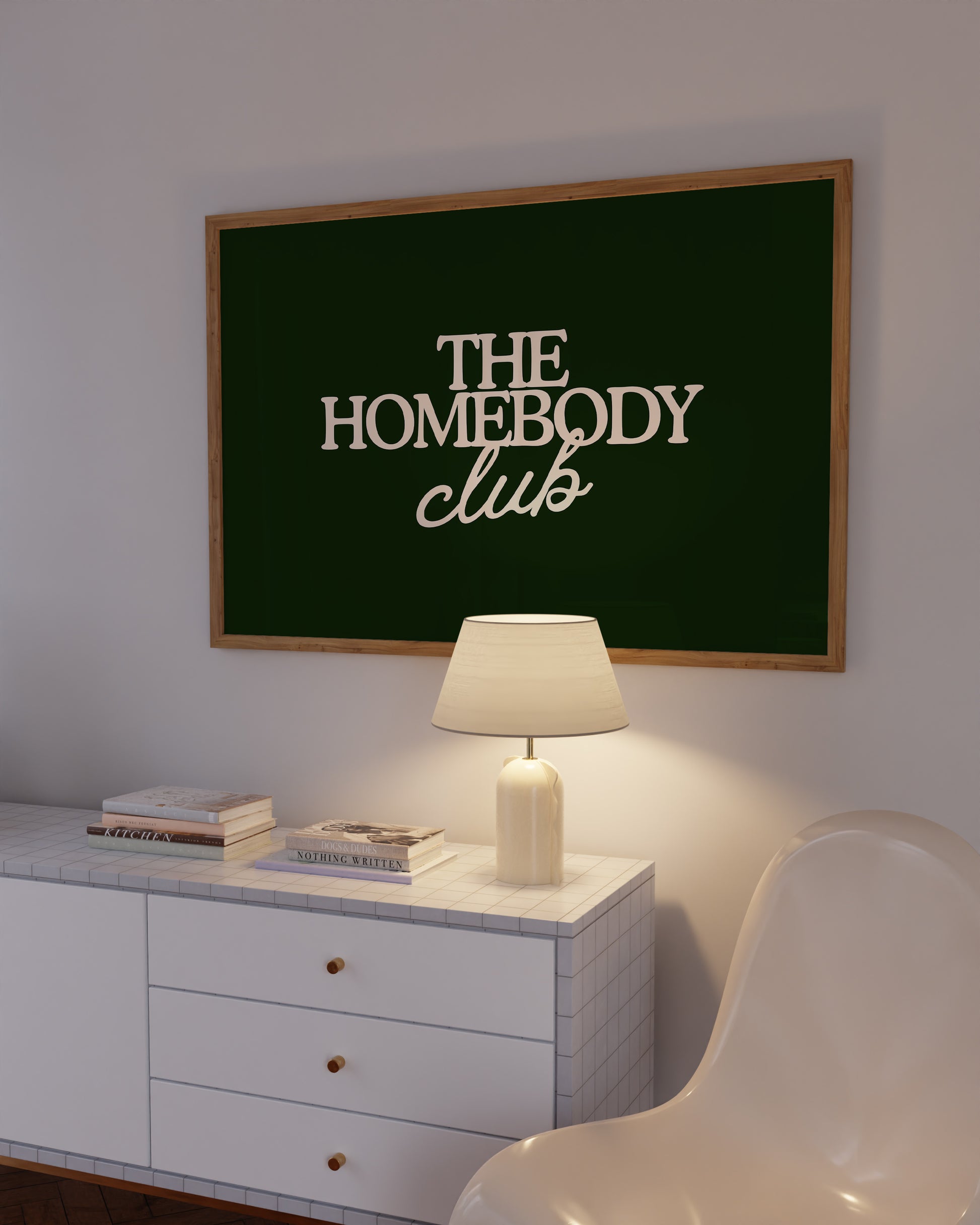 Dark green print with "The Homebody Club" in cream serif and script typography