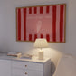 Horizontal print with bold red and pink vertical stripes and a hand-drawn ice cream cone illustration inside a rectangular border, with the words "HAVE A SWEET TREAT" in outlined block lettering.