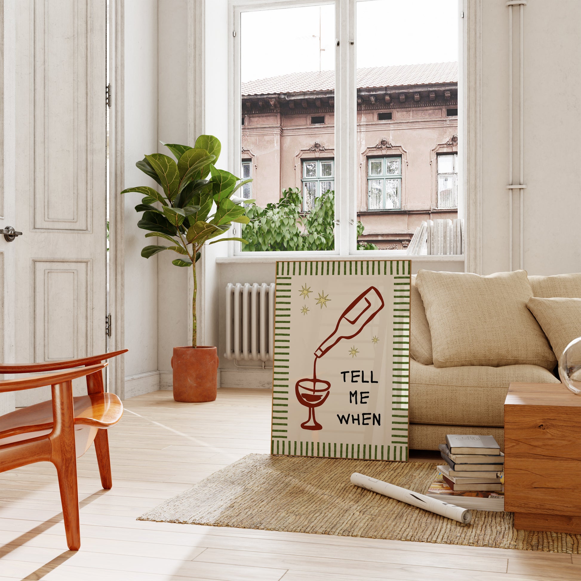 Vertical cream wall print with green stripe border, gold star details, and bold black typography reading Tell Me When alongside dark red hand-drawn line art of a wine bottle pouring into a glass