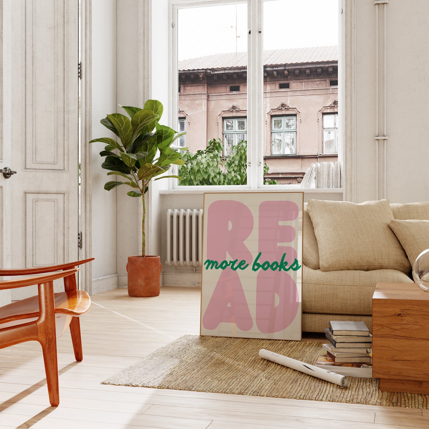 Vertical print with the word "READ" in oversized pink bubble letters and "more books" in green cursive script layered across it, on a white background.