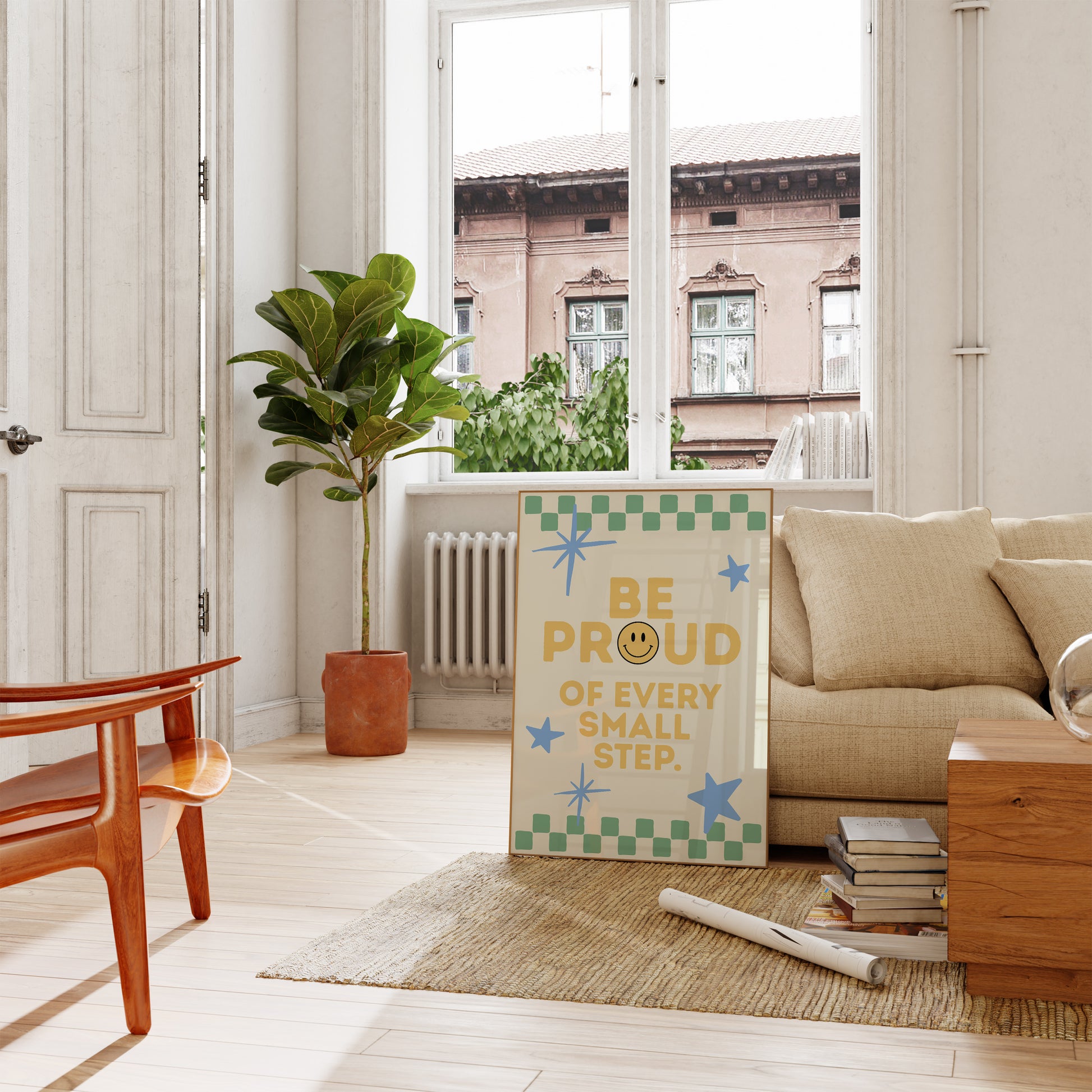 Cream print with a green checkered border, blue stars, and the phrase 'Be Proud of every small step' in yellow lettering with a smiley face replacing the O in Proud