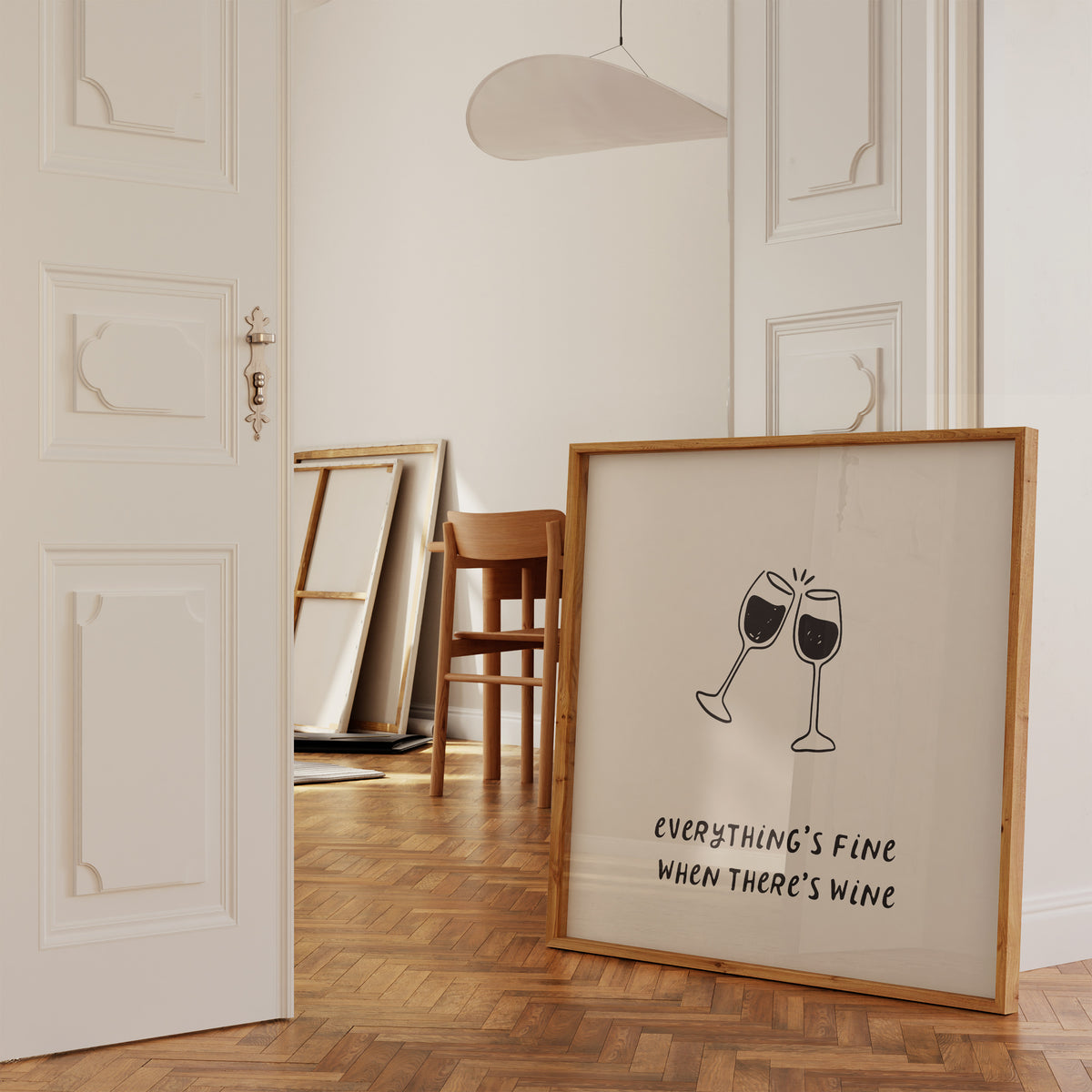 Square print with a hand-drawn illustration of two wine glasses clinking together, and the quote "everything's fine when there's wine" in bold black lettering below.