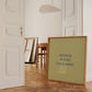 Square print with an olive green background and the quote "Actually it is all fun & games." in bold blue hand-lettered type.