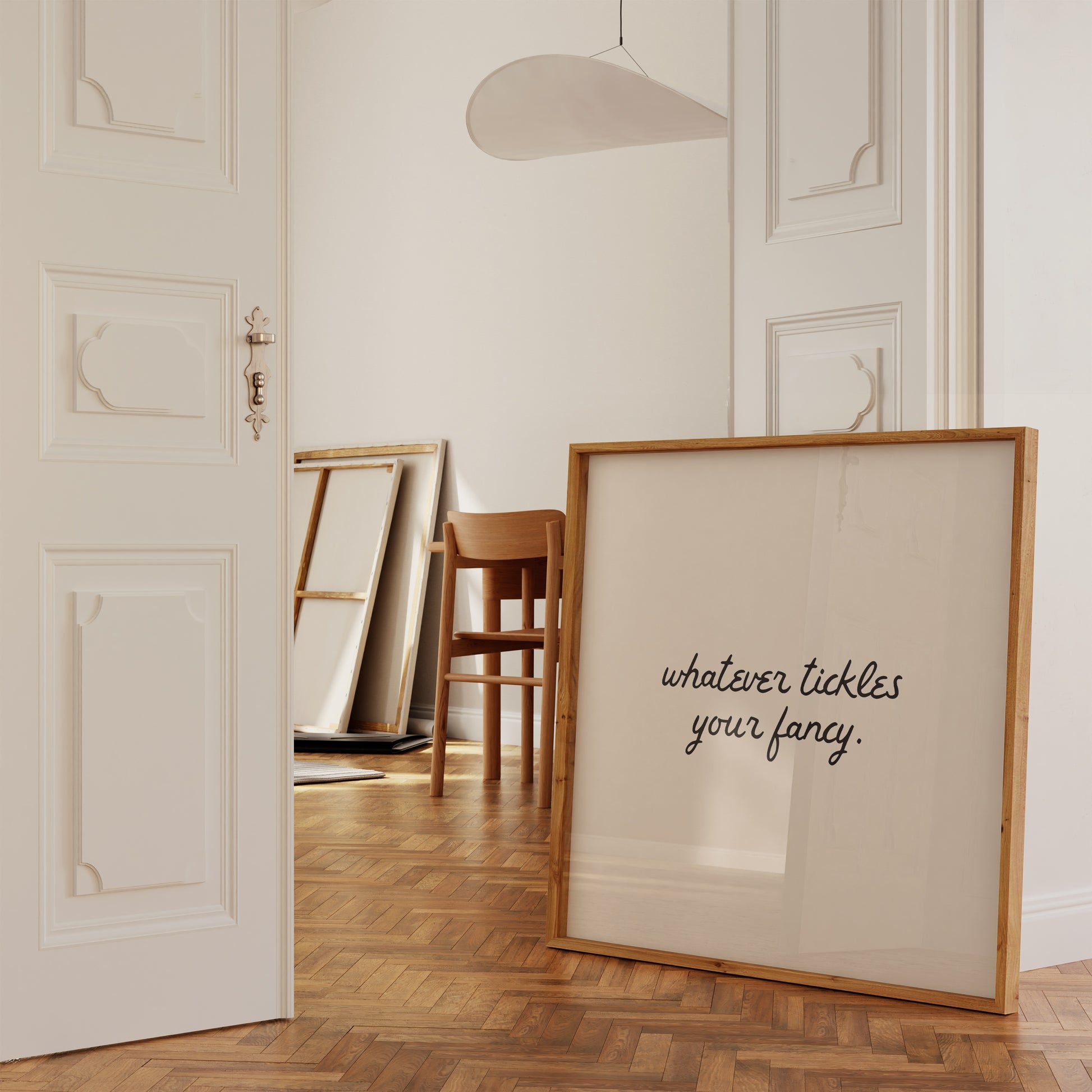 Neutral cream print featuring the handwritten script quote "whatever tickles your fancy."