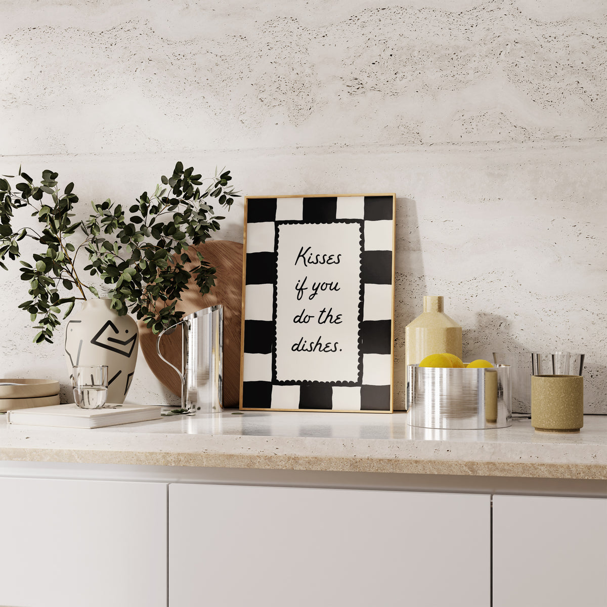 Black and white checkered print with a scalloped border and the handwritten quote "Kisses if you do the dishes" in black script