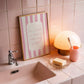 Pink and cream striped print featuring the handwritten quote "I'm nicer when I like my outfit" in pink script