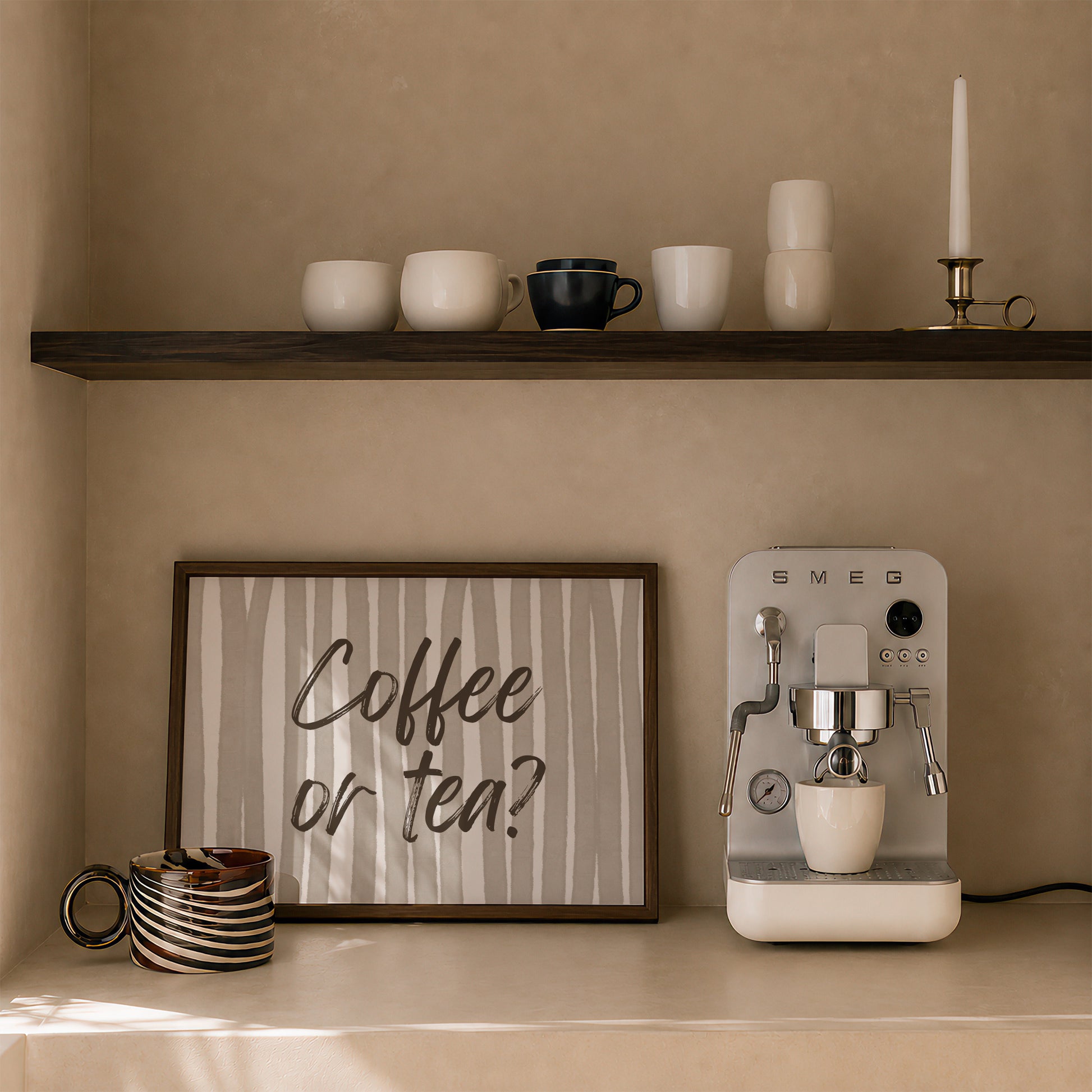 Horizontal print with hand-painted taupe and cream vertical stripes and the question "Coffee or tea?" in brown brush-lettered script across the center.