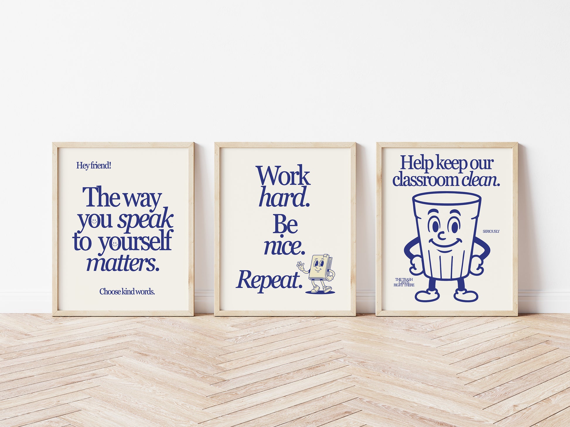 Set of 3 vertical navy and cream retro classroom prints with bold typography and character mascots including a trash can and walking book