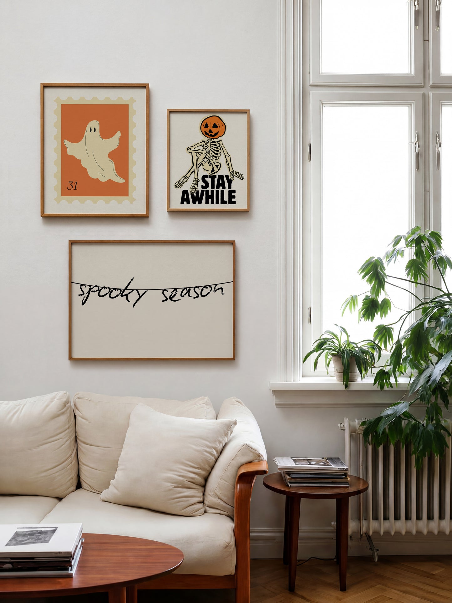 Set of five Halloween prints featuring a ghost postage stamp, bold newspaper-style lettering, a spooky season banner, a trick-or-treat ticket, and a jack-o'-lantern skeleton