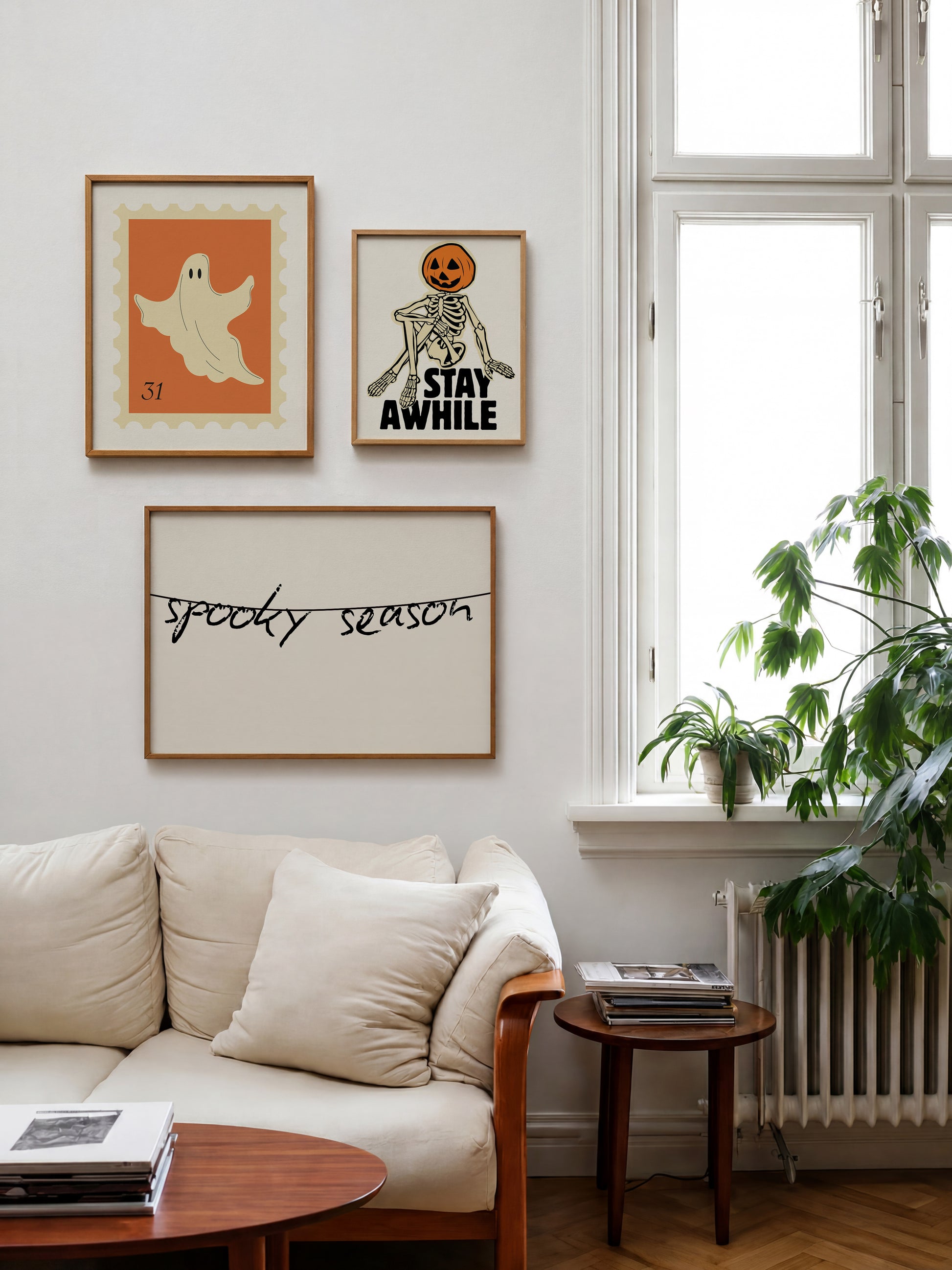 Set of five Halloween prints featuring a ghost postage stamp, bold newspaper-style lettering, a spooky season banner, a trick-or-treat ticket, and a jack-o'-lantern skeleton