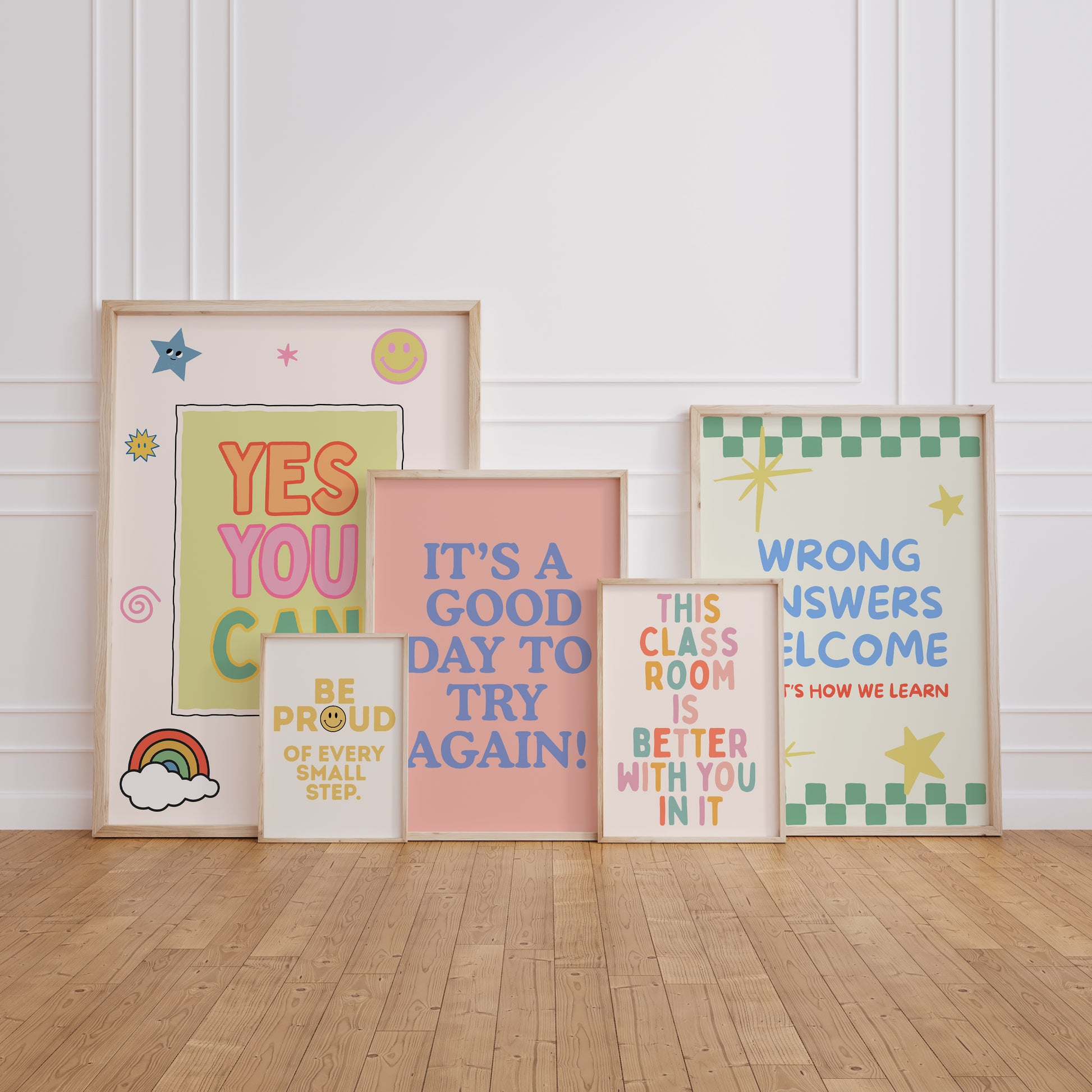 Set of 10 pastel classroom prints in a retro style, including blue pennant flags reading kind, brave, curious, a daily feelings check-in chart with smiling star, cloud, and sun characters, a puzzle piece print reading "There's a place for everyone," and colourful typography posters with quotes like "Wrong answers welcome," "Yes you can," and "It's a good day to try again."