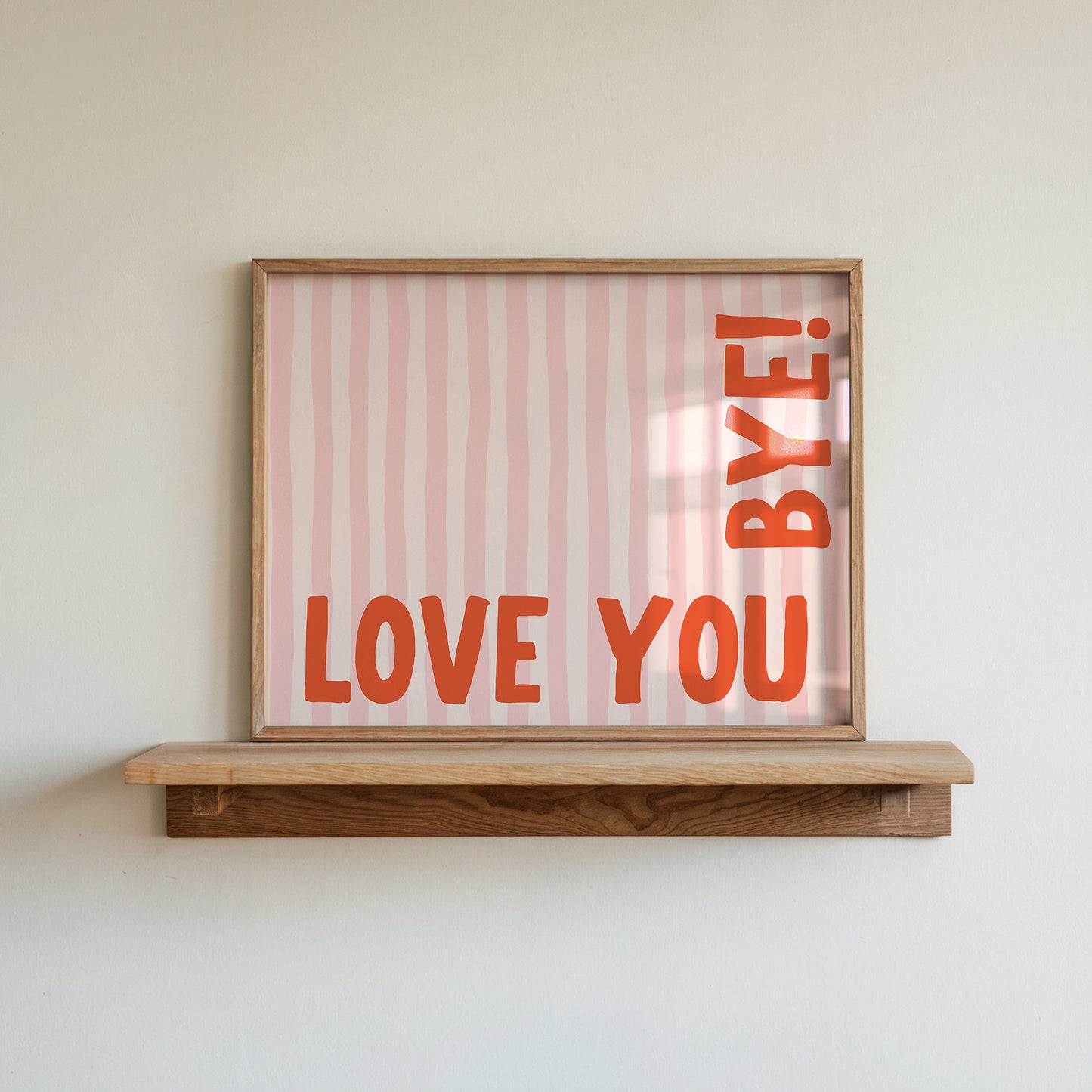 Horizontal wall print with soft pink wavy vertical stripes and bold red rounded typography reading LOVE YOU BYE! in the bottom corner