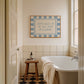 Actually It Is All Fun & Games blue checkered horizontal art print above freestanding bath — sassy bathroom wall decor