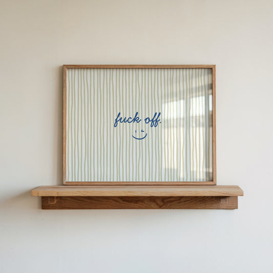 Beige and olive vertical striped print with "fuck off." in navy script and a small winking smiley face