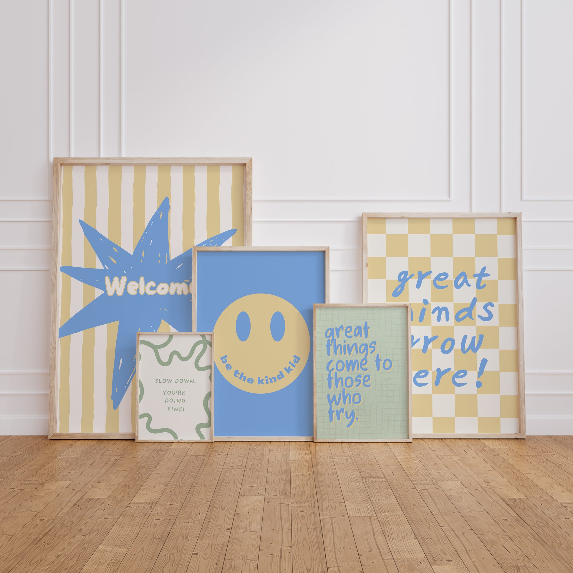Set of 10 classroom prints in blue, green, and yellow: Yes You Can, Every Voice Matters Here, Slow Down You're Doing Fine, Progress Over Perfection, a starburst Welcome illustration, an Attendance Check print reading Show Up As You Are, Great Minds Grow Here on a checkered background, a smiley face reading Be the Kind Kid, Mistakes Help Us Learn, and Great Things Come to Those Who Try.