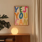 Vertical print with the words "YES YOU CAN" in large multicolored bubble letters — blue, green, pink, orange, yellow, and olive — on a white background.