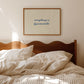 Horizontal print with thin hand-drawn sage green vertical stripes on a white background and the quote "everything is figureoutable." in navy blue cursive script at the centre.