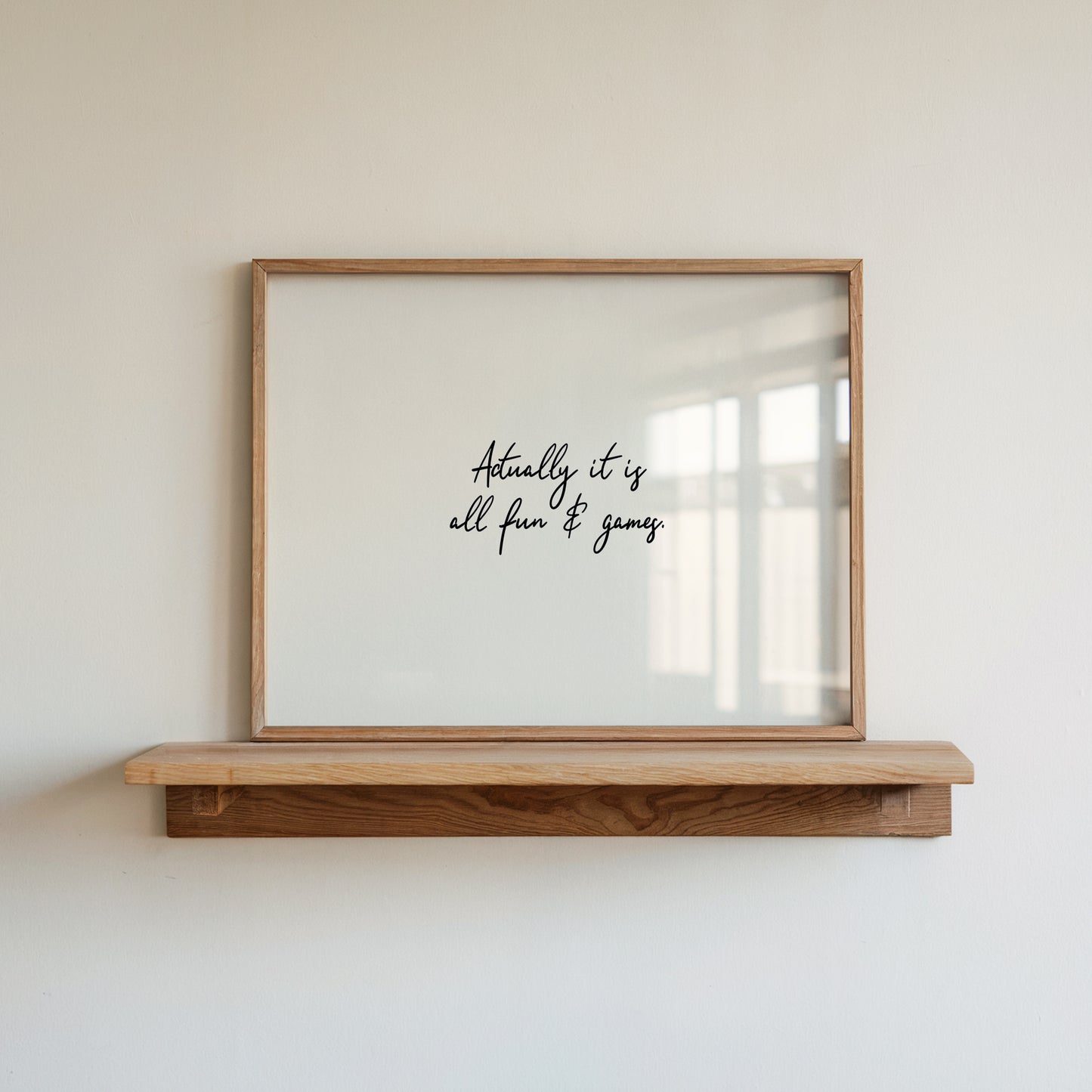 Bold art print typography reading 'Actually It Is All Fun & Games'