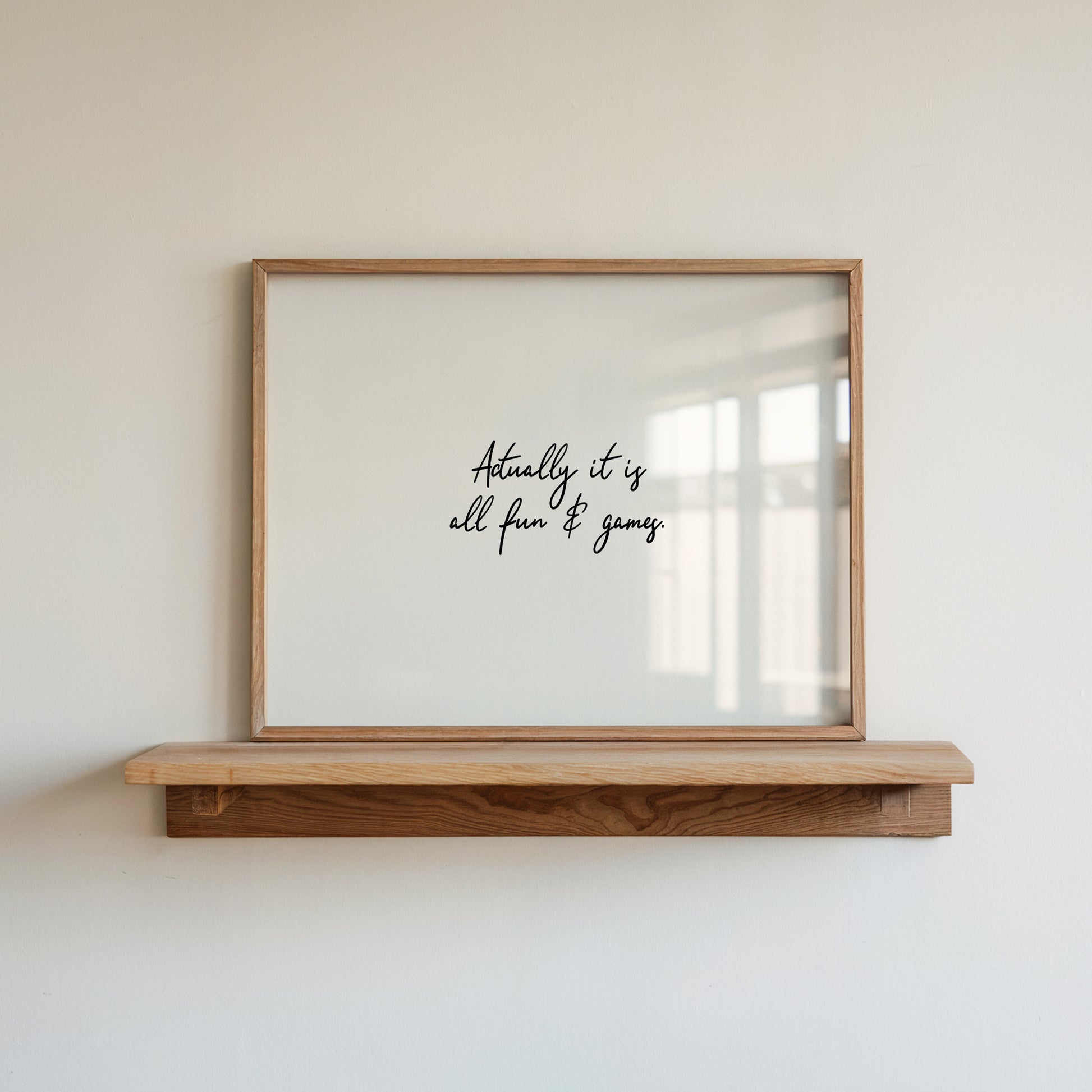 Bold art print typography reading 'Actually It Is All Fun & Games'