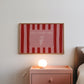 Horizontal print with bold red and pink vertical stripes and a hand-drawn ice cream cone illustration inside a rectangular border, with the words "HAVE A SWEET TREAT" in outlined block lettering.