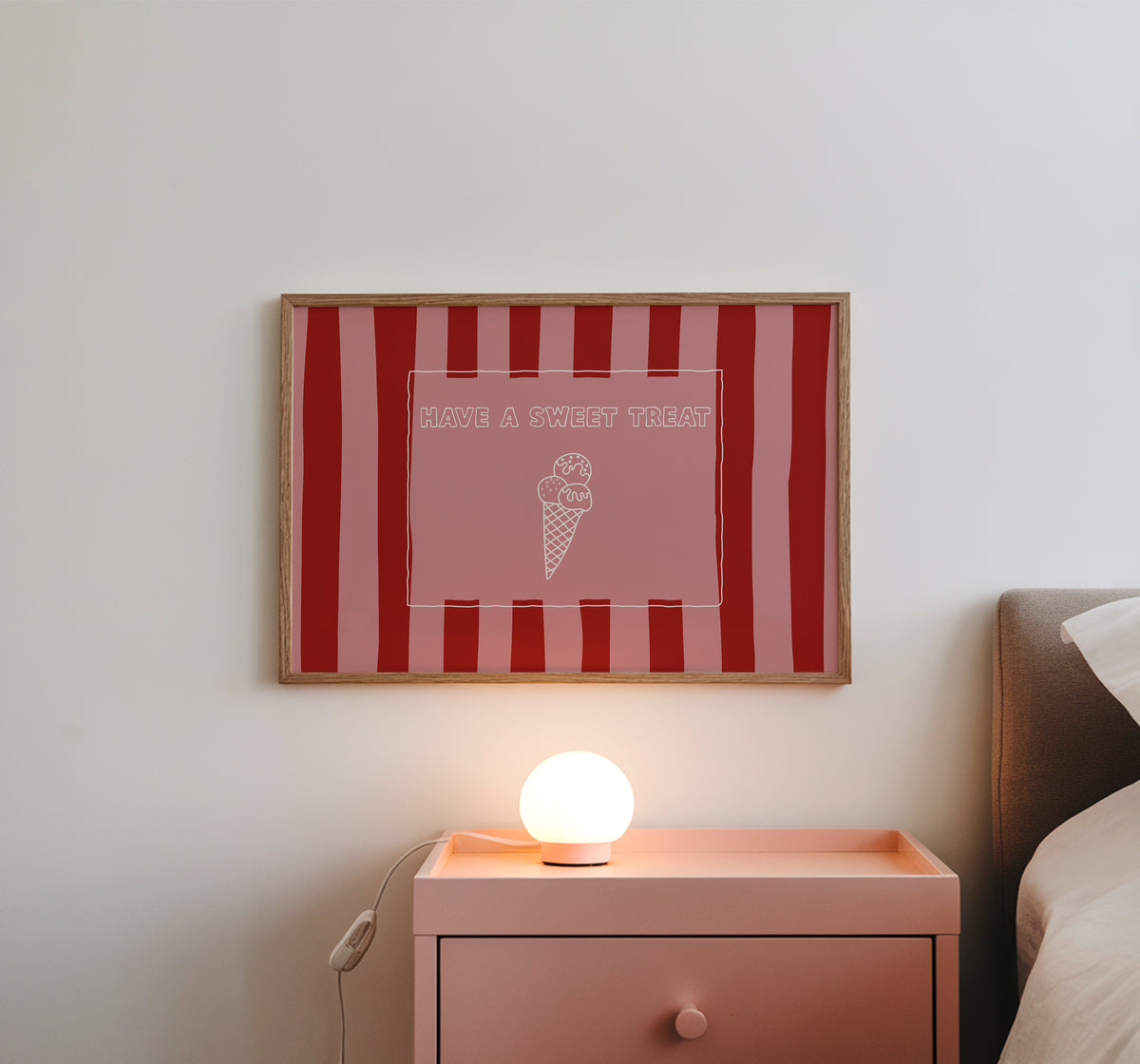 Horizontal print with bold red and pink vertical stripes and a hand-drawn ice cream cone illustration inside a rectangular border, with the words "HAVE A SWEET TREAT" in outlined block lettering.