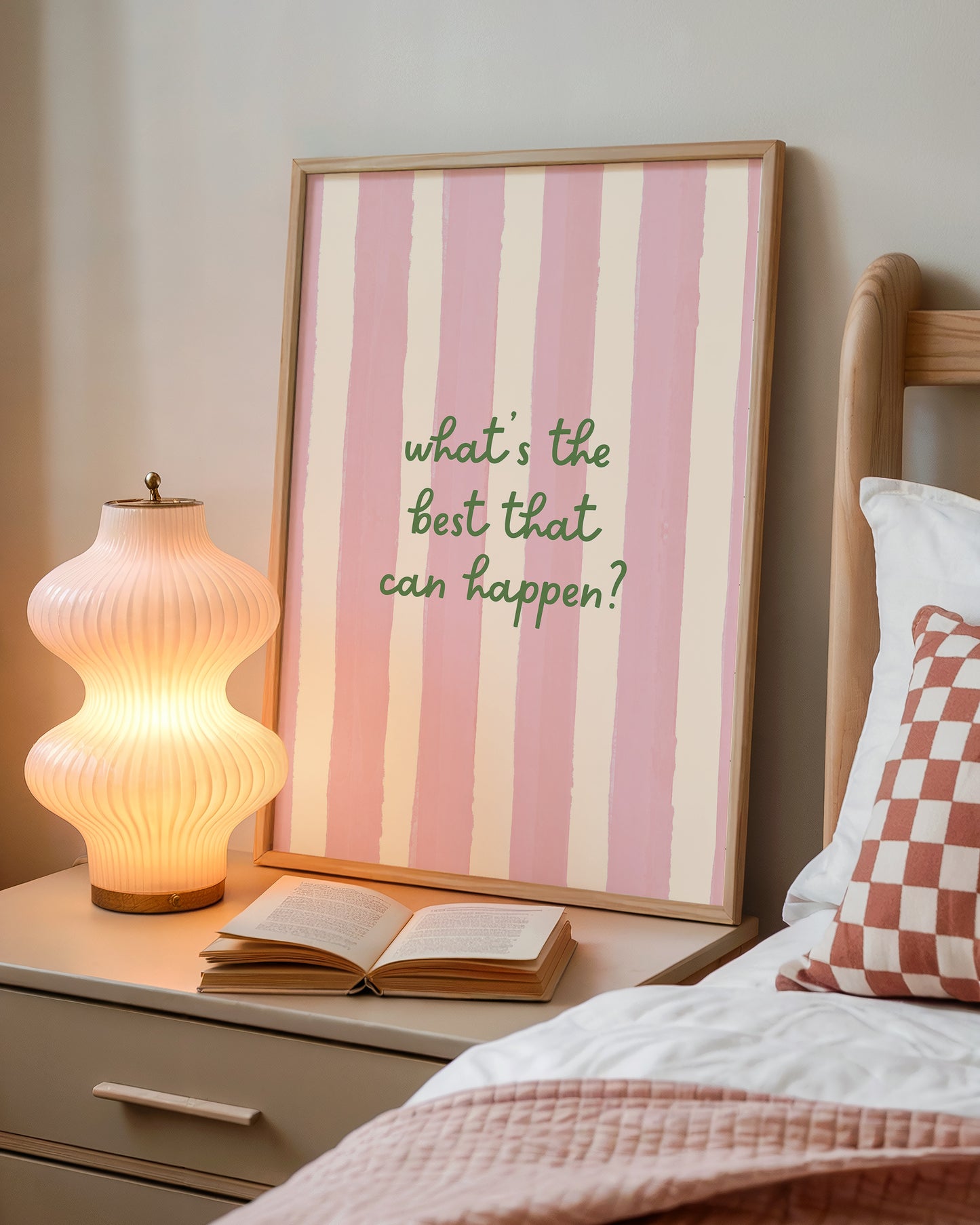 Print with soft pink hand-painted brush stroke stripes and the quote "What's the best that can happen" in script lettering.