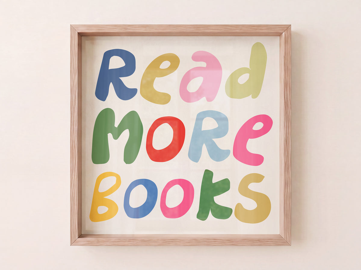 Square print with the words "Read More Books" in large multicolored bubble letters — blue, yellow, pink, green, red, and orange — stacked on three lines against a cream background.
