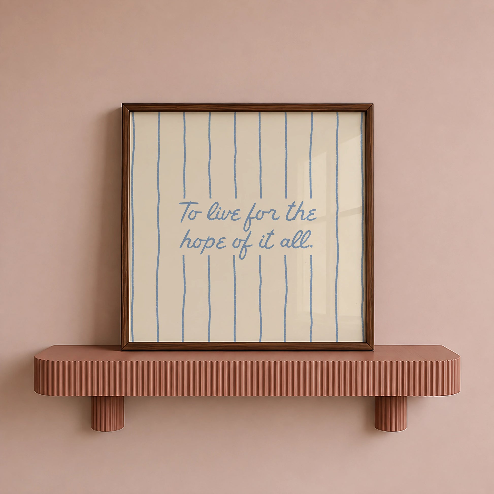 Cream print with thin vertical blue stripes and a hand-lettered quote in blue cursive script