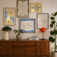 Set of five prints in butter yellow and blue: "The Homebody Club," a floral illustration, "everything is figureoutable," "The good times are here" with stars, and "you are my sunshine" with a sun