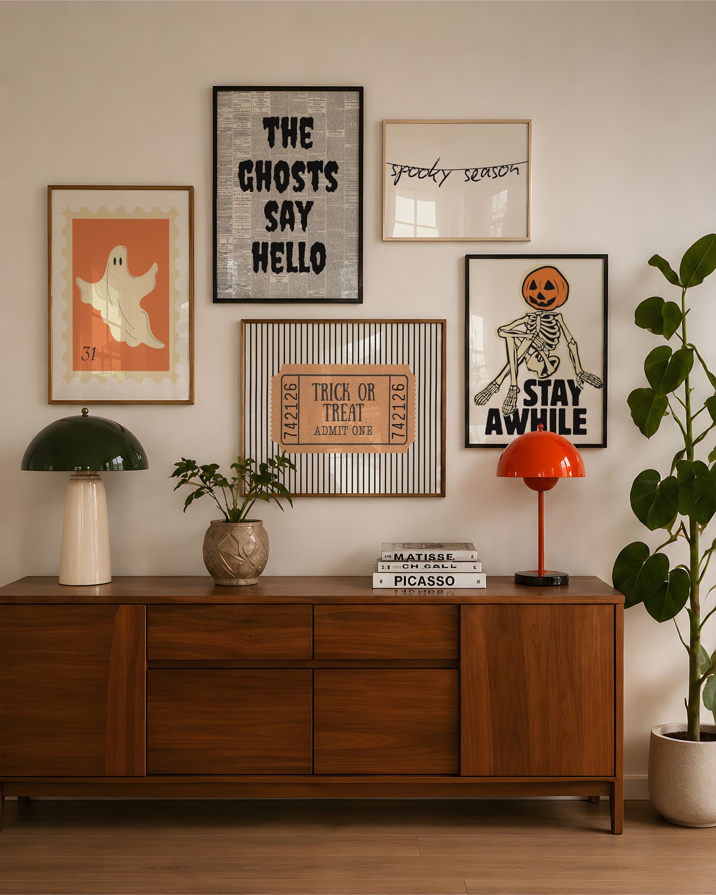 Set of five Halloween prints featuring a ghost postage stamp, bold newspaper-style lettering, a spooky season banner, a trick-or-treat ticket, and a jack-o'-lantern skeleton