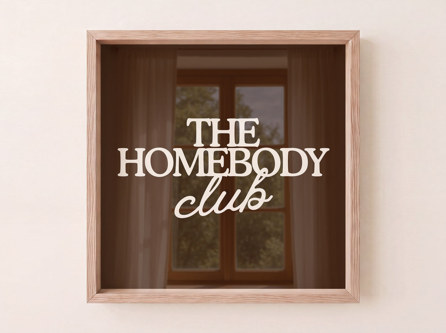 Dark brown print with "The Homebody Club" in bold cream serif and script typography