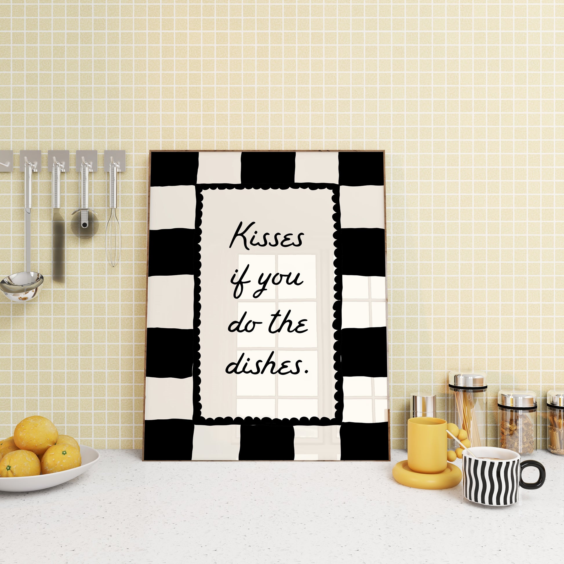 Black and white checkered print with a scalloped border and the handwritten quote "Kisses if you do the dishes" in black script