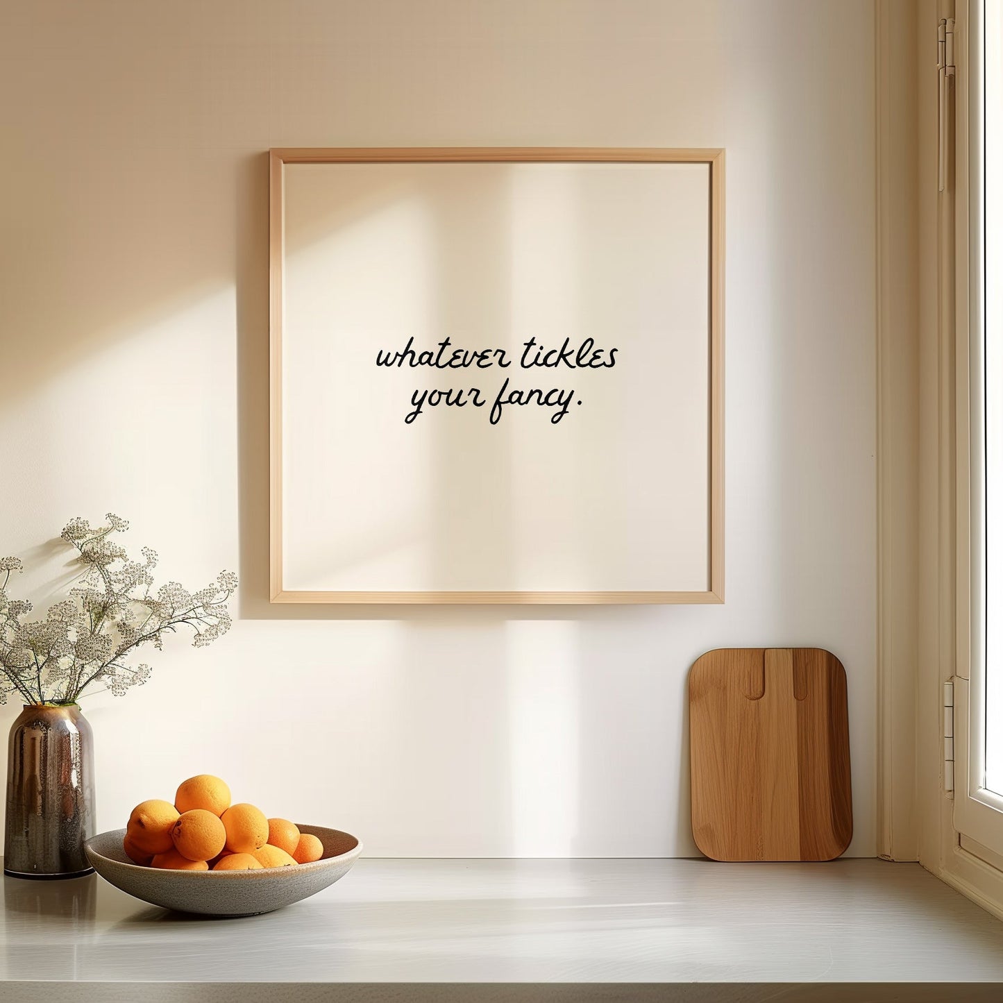 Neutral cream print featuring the handwritten script quote "whatever tickles your fancy."